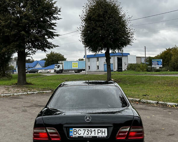 Чорний Мерседес Е-Клас, об'ємом двигуна 2 л та пробігом 350 тис. км за 2499 $, фото 3 на Automoto.ua