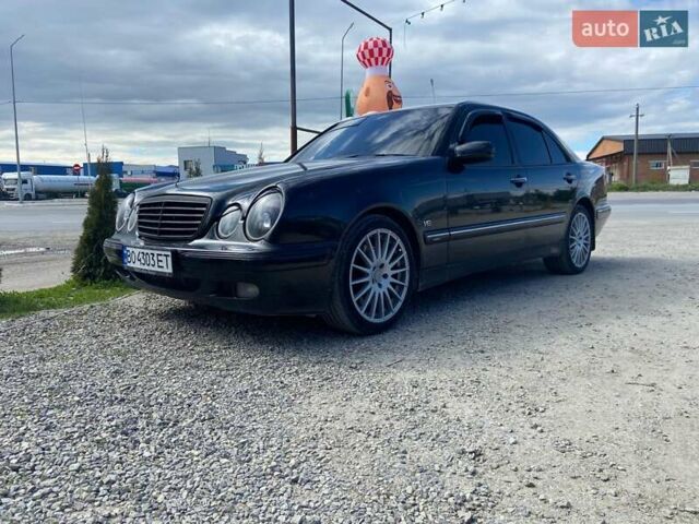 Черный Мерседес Е-Класс, объемом двигателя 4.3 л и пробегом 380 тыс. км за 7299 $, фото 1 на Automoto.ua