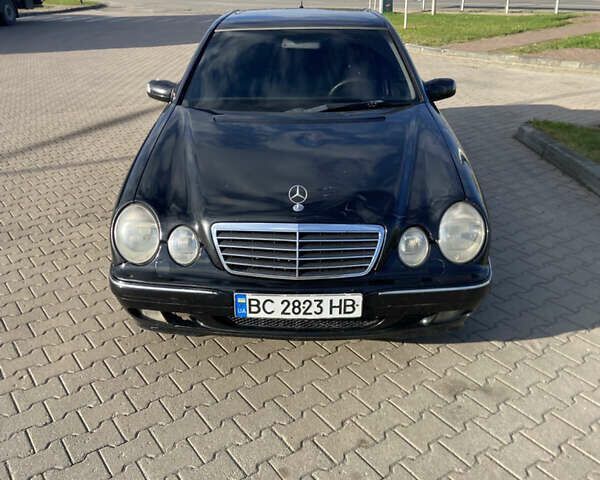 Чорний Мерседес Е-Клас, об'ємом двигуна 2 л та пробігом 100 тис. км за 3100 $, фото 23 на Automoto.ua