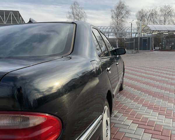Чорний Мерседес Е-Клас, об'ємом двигуна 2 л та пробігом 259 тис. км за 4000 $, фото 7 на Automoto.ua