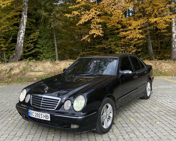 Черный Мерседес Е-Класс, объемом двигателя 2 л и пробегом 100 тыс. км за 3100 $, фото 2 на Automoto.ua