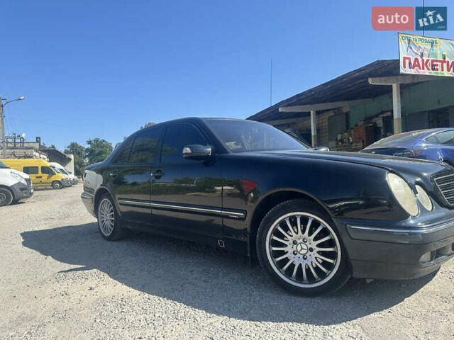 Мерседес Е-Клас 2000 у Житомирі на Automoto.ua Чорний Мерседес Е-Клас, об'ємом двигуна 2 л та пробігом 350 тис. км за 4200 $, фото 1 на Automoto.ua