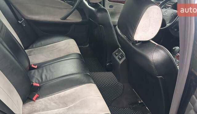 Черный Мерседес Е-Класс, объемом двигателя 2 л и пробегом 221 тыс. км за 3600 $, фото 4 на Automoto.ua