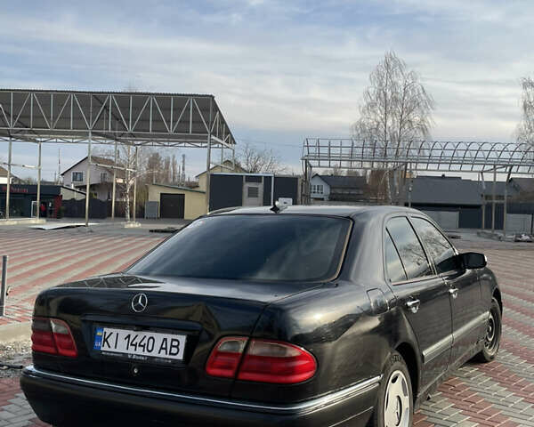 Чорний Мерседес Е-Клас, об'ємом двигуна 2 л та пробігом 259 тис. км за 4000 $, фото 9 на Automoto.ua