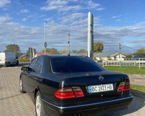 Чорний Мерседес Е-Клас, об'ємом двигуна 2 л та пробігом 100 тис. км за 3100 $, фото 25 на Automoto.ua