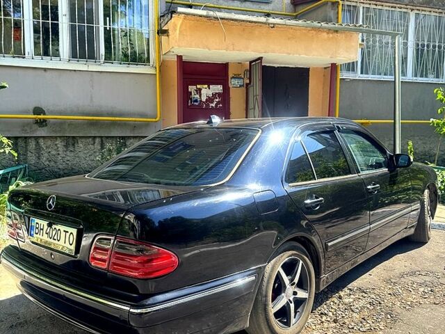 Черный Мерседес Е-Класс, объемом двигателя 3.2 л и пробегом 40 тыс. км за 5000 $, фото 3 на Automoto.ua