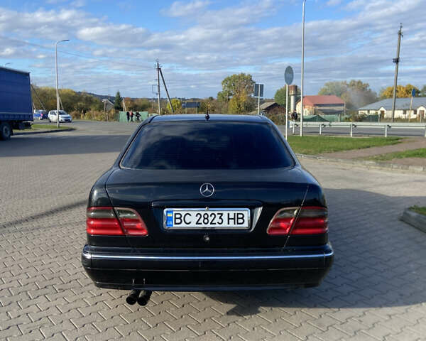 Чорний Мерседес Е-Клас, об'ємом двигуна 2 л та пробігом 100 тис. км за 3100 $, фото 20 на Automoto.ua