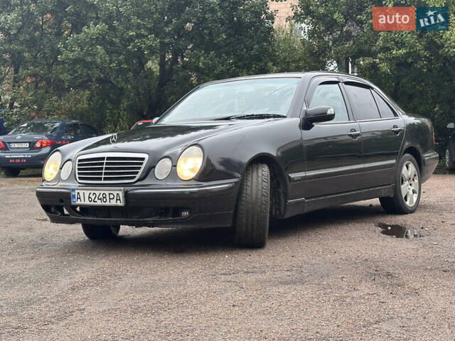 Черный Мерседес Е-Класс, объемом двигателя 2 л и пробегом 400 тыс. км за 3250 $, фото 8 на Automoto.ua