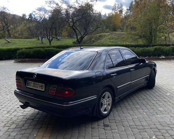 Чорний Мерседес Е-Клас, об'ємом двигуна 2 л та пробігом 100 тис. км за 3100 $, фото 5 на Automoto.ua