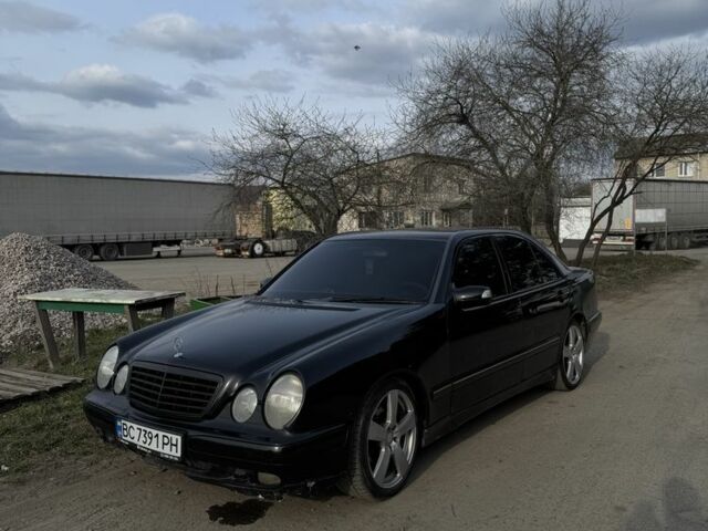 Черный Мерседес Е-Класс, объемом двигателя 2 л и пробегом 400 тыс. км за 2500 $, фото 1 на Automoto.ua