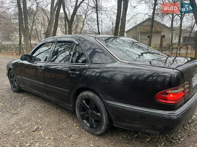 Черный Мерседес Е-Класс, объемом двигателя 2 л и пробегом 358 тыс. км за 2600 $, фото 7 на Automoto.ua