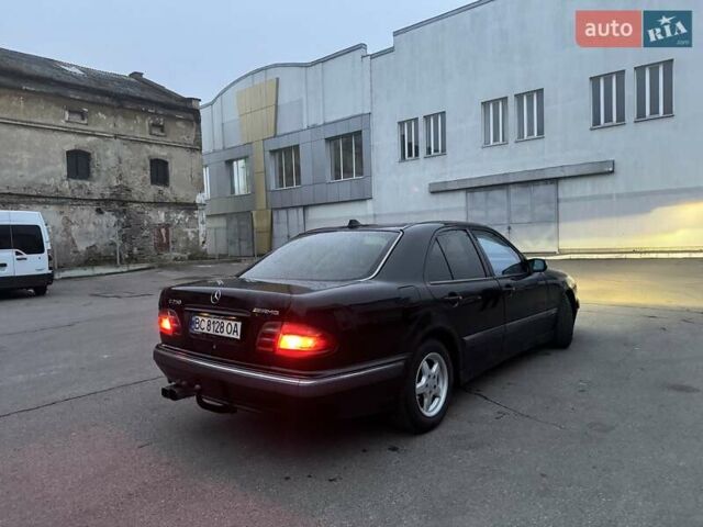 Черный Мерседес Е-Класс, объемом двигателя 2.1 л и пробегом 345 тыс. км за 3500 $, фото 4 на Automoto.ua