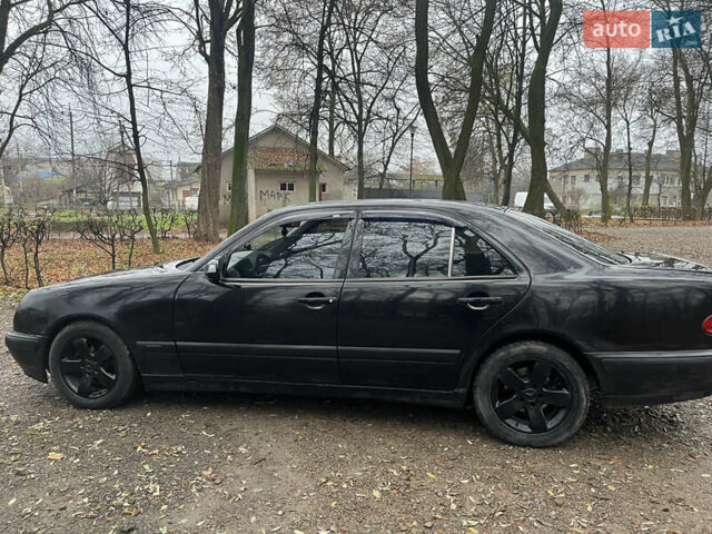 Черный Мерседес Е-Класс, объемом двигателя 2 л и пробегом 358 тыс. км за 2600 $, фото 8 на Automoto.ua