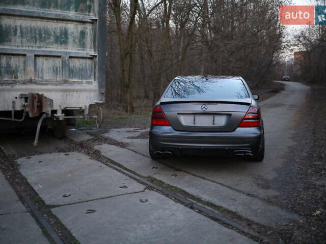 Чорний Мерседес Е-Клас, об'ємом двигуна 5 л та пробігом 320 тис. км за 12000 $, фото 1 на Automoto.ua