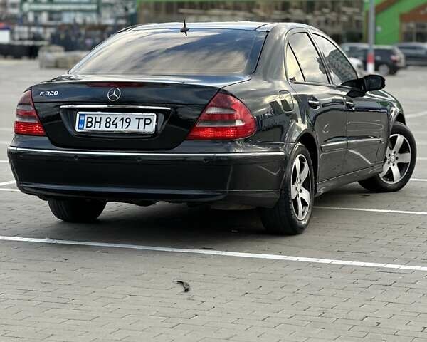 Черный Мерседес Е-Класс, объемом двигателя 3.2 л и пробегом 243 тыс. км за 4699 $, фото 5 на Automoto.ua