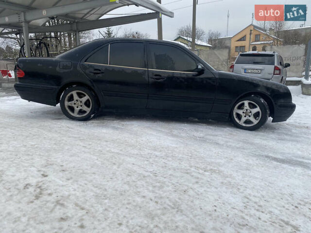 Черный Мерседес Е-Класс, объемом двигателя 2 л и пробегом 390 тыс. км за 3300 $, фото 1 на Automoto.ua