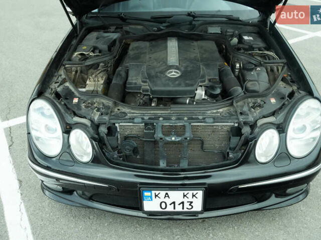 Черный Мерседес Е-Класс, объемом двигателя 4.97 л и пробегом 300 тыс. км за 9300 $, фото 14 на Automoto.ua