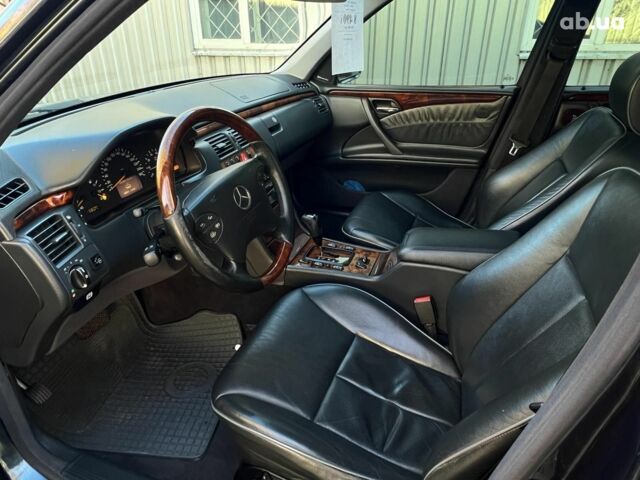 Черный Мерседес Е-Класс, объемом двигателя 2.8 л и пробегом 241 тыс. км за 8490 $, фото 9 на Automoto.ua