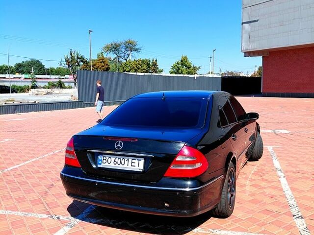 Черный Мерседес Е-Класс, объемом двигателя 2.4 л и пробегом 235 тыс. км за 5100 $, фото 1 на Automoto.ua