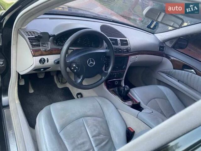 Чорний Мерседес Е-Клас, об'ємом двигуна 1.8 л та пробігом 343 тис. км за 5550 $, фото 8 на Automoto.ua