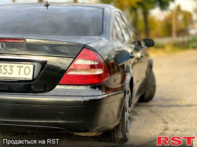 Мерседес Е-Клас 2002 у Кривому Розі на Automoto.ua Чорний Мерседес Е-Клас, об'ємом двигуна 2.6 л та пробігом 307 тис. км за 6500 $, фото 4 на Automoto.ua