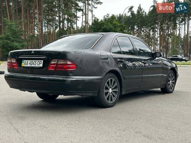 Черный Мерседес Е-Класс, объемом двигателя 2 л и пробегом 423 тыс. км за 2950 $, фото 3 на Automoto.ua