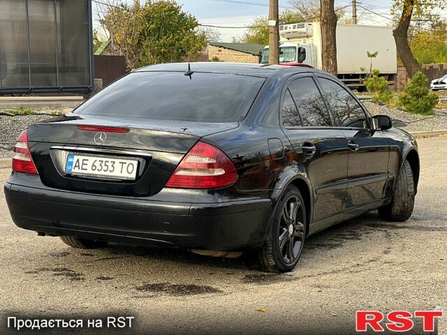 Мерседес Е-Клас 2002 у Кривому Розі на Automoto.ua Чорний Мерседес Е-Клас, об'ємом двигуна 2.6 л та пробігом 307 тис. км за 6500 $, фото 5 на Automoto.ua