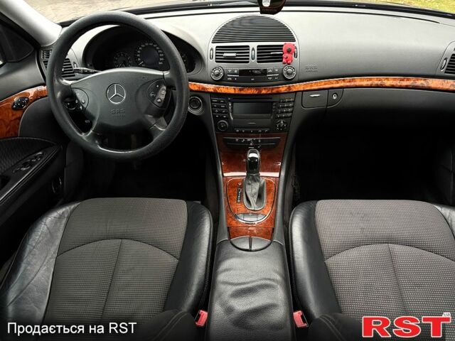 Черный Мерседес Е-Класс, объемом двигателя 1.8 л и пробегом 220 тыс. км за 5950 $, фото 7 на Automoto.ua