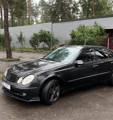 Чорний Мерседес Е-Клас, об'ємом двигуна 4.97 л та пробігом 351 тис. км за 9000 $, фото 4 на Automoto.ua