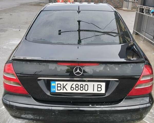 Черный Мерседес Е-Класс, объемом двигателя 1.8 л и пробегом 40 тыс. км за 5700 $, фото 7 на Automoto.ua