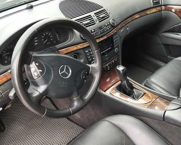 Черный Мерседес Е-Класс, объемом двигателя 1.8 л и пробегом 40 тыс. км за 5700 $, фото 6 на Automoto.ua