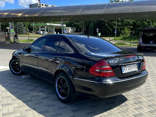 Мерседес Е-Класс 2003 в Полтаве на Automoto.ua Черный Мерседес Е-Класс, объемом двигателя 1.8 л и пробегом 340 тыс. км за 6200 $, фото 3 на Automoto.ua