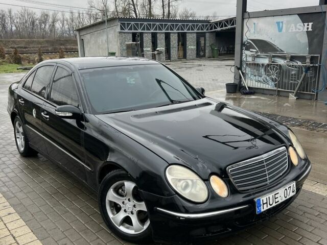 Черный Мерседес Е-Класс, объемом двигателя 2.2 л и пробегом 298 тыс. км за 2650 $, фото 1 на Automoto.ua