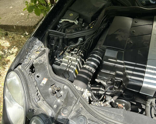 Черный Мерседес Е-Класс, объемом двигателя 2.6 л и пробегом 175 тыс. км за 7950 $, фото 12 на Automoto.ua