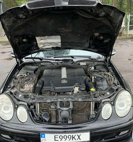 Чорний Мерседес Е-Клас, об'ємом двигуна 4.97 л та пробігом 351 тис. км за 9000 $, фото 21 на Automoto.ua