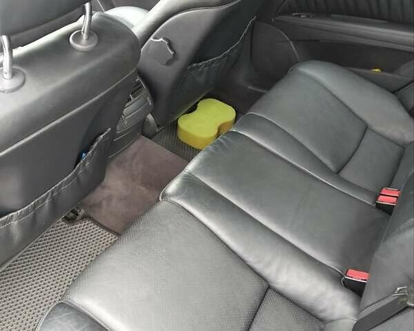 Черный Мерседес Е-Класс, объемом двигателя 1.8 л и пробегом 40 тыс. км за 5700 $, фото 4 на Automoto.ua