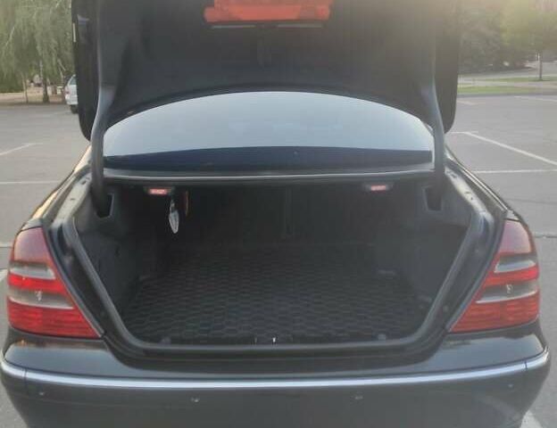 Черный Мерседес Е-Класс, объемом двигателя 2.69 л и пробегом 400 тыс. км за 7700 $, фото 2 на Automoto.ua