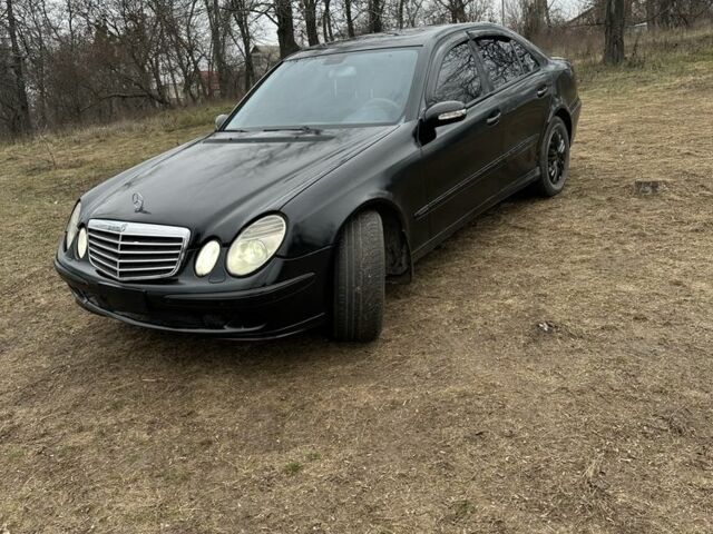 Чорний Мерседес Е-Клас, об'ємом двигуна 3.2 л та пробігом 231 тис. км за 2500 $, фото 1 на Automoto.ua