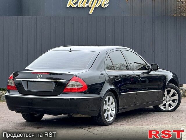 Черный Мерседес Е-Класс, объемом двигателя 1.8 л и пробегом 220 тыс. км за 5950 $, фото 2 на Automoto.ua