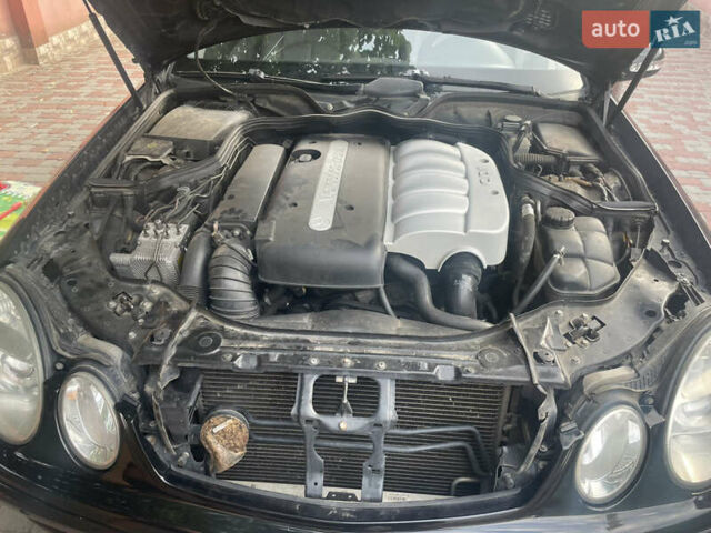 Черный Мерседес Е-Класс, объемом двигателя 2.2 л и пробегом 296 тыс. км за 6900 $, фото 9 на Automoto.ua