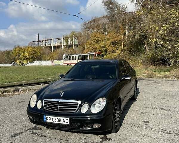 Черный Мерседес Е-Класс, объемом двигателя 2.6 л и пробегом 240 тыс. км за 5999 $, фото 7 на Automoto.ua