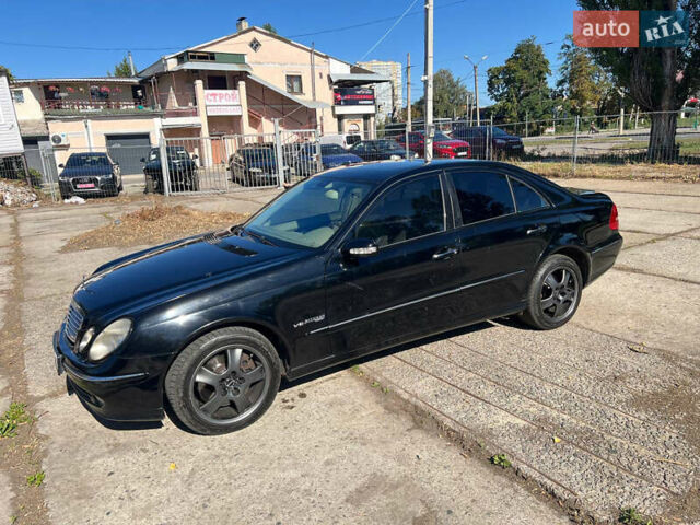 Чорний Мерседес Е-Клас, об'ємом двигуна 4.97 л та пробігом 341 тис. км за 4999 $, фото 11 на Automoto.ua