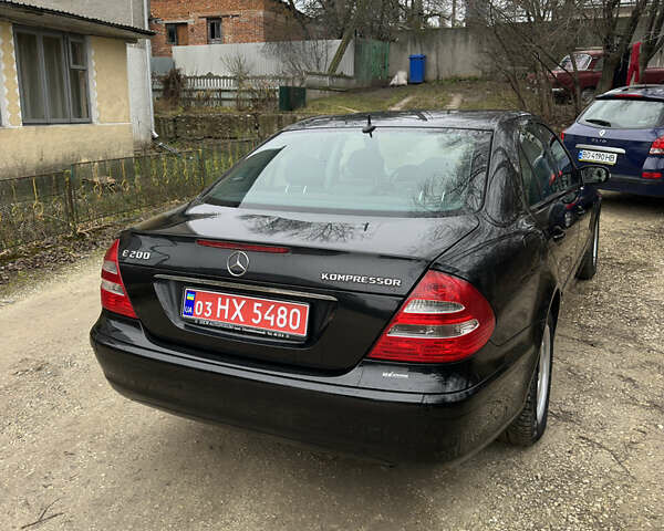 Чорний Мерседес Е-Клас, об'ємом двигуна 1.8 л та пробігом 298 тис. км за 7500 $, фото 9 на Automoto.ua