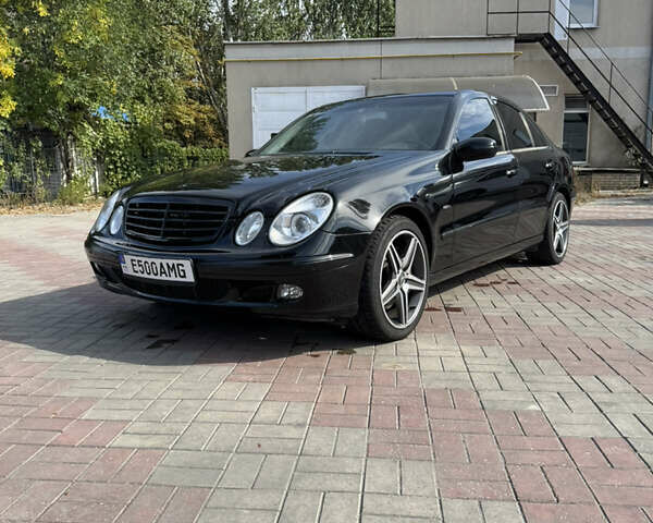 Черный Мерседес Е-Класс, объемом двигателя 4.97 л и пробегом 360 тыс. км за 10000 $, фото 9 на Automoto.ua