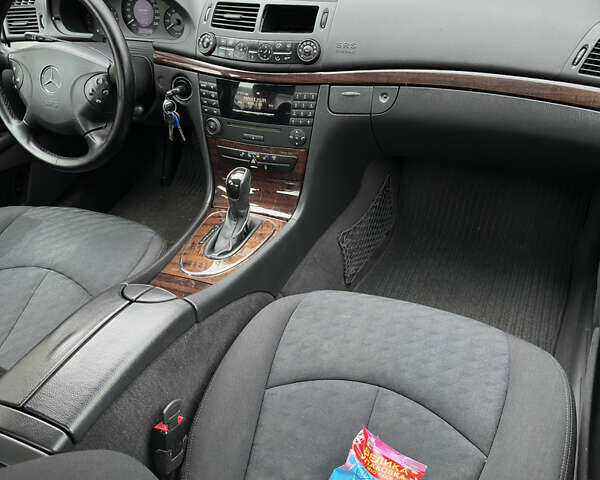 Чорний Мерседес Е-Клас, об'ємом двигуна 1.8 л та пробігом 298 тис. км за 7500 $, фото 26 на Automoto.ua