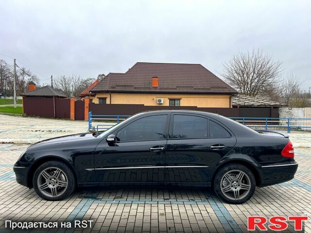 Черный Мерседес Е-Класс, объемом двигателя 3.2 л и пробегом 325 тыс. км за 6500 $, фото 2 на Automoto.ua