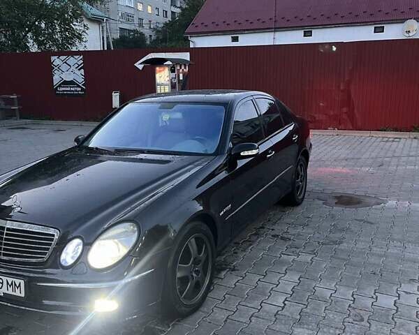 Черный Мерседес Е-Класс, объемом двигателя 4.97 л и пробегом 327 тыс. км за 5200 $, фото 8 на Automoto.ua