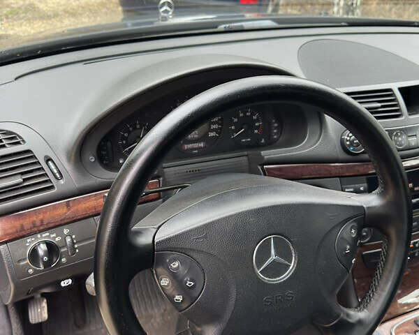 Чорний Мерседес Е-Клас, об'ємом двигуна 1.8 л та пробігом 298 тис. км за 7500 $, фото 19 на Automoto.ua