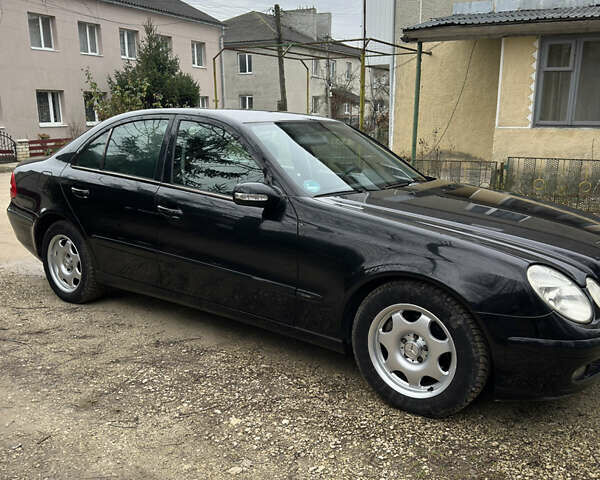 Чорний Мерседес Е-Клас, об'ємом двигуна 1.8 л та пробігом 298 тис. км за 7500 $, фото 7 на Automoto.ua