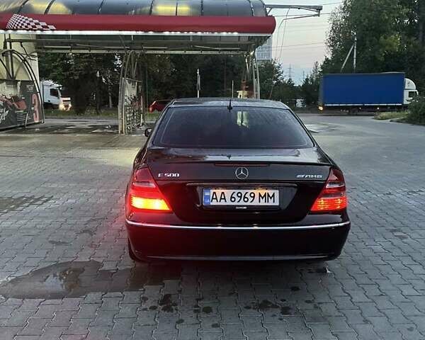 Черный Мерседес Е-Класс, объемом двигателя 4.97 л и пробегом 327 тыс. км за 5200 $, фото 1 на Automoto.ua